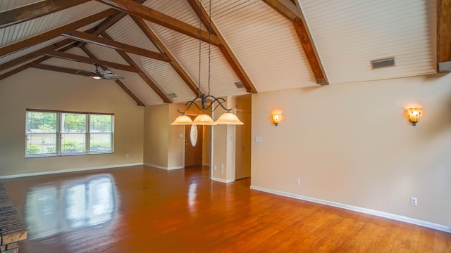 1097 Bob Mccaskill Dr, Defuniak Springs, FL 32433 - empty room with wood finished floors, baseboards, beamed ceiling, a ceiling fan, and high vaulted ceiling