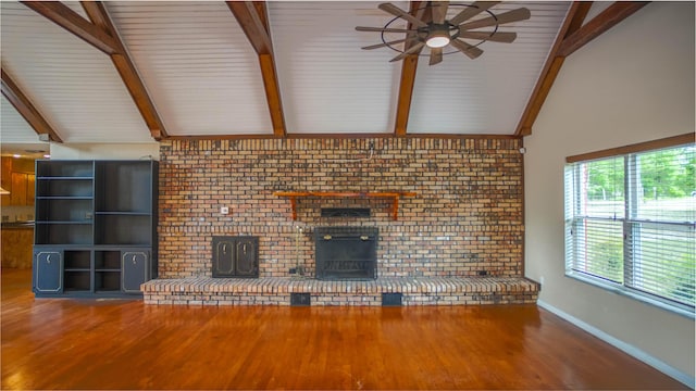 1097 Bob Mccaskill Dr, Defuniak Springs, FL 32433 - unfurnished living room featuring wood finished floors, a ceiling fan, wood ceiling, baseboards, and brick wall
