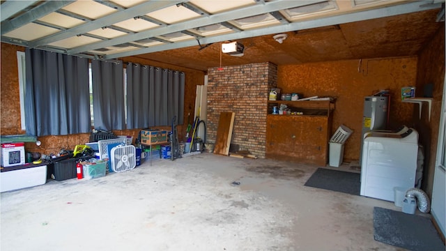 1097 Bob Mccaskill Dr, Defuniak Springs, FL 32433 - garage with a garage door opener, water heater, and washer / dryer
