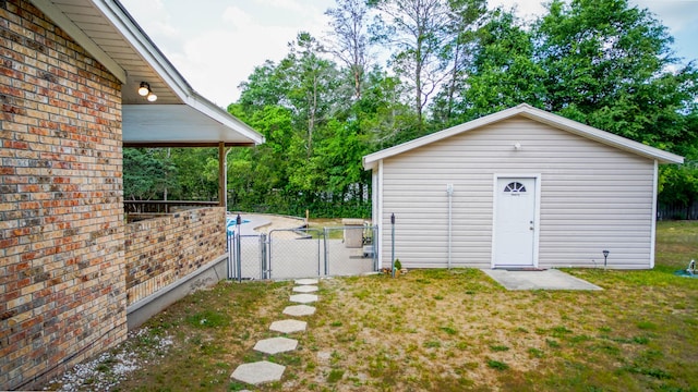 1097 Bob Mccaskill Dr, Defuniak Springs, FL 32433 - view of yard featuring a gate and an outbuilding