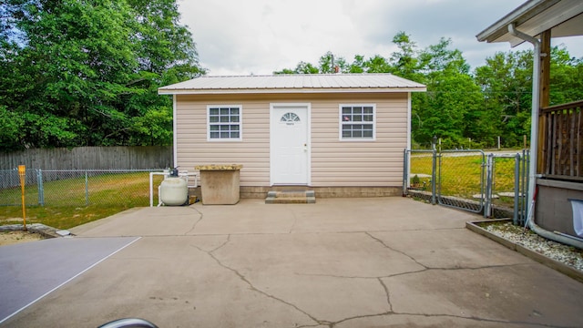 1097 Bob Mccaskill Dr, Defuniak Springs, FL 32433 - view of outbuilding with fence, entry steps, a gate, and an outbuilding