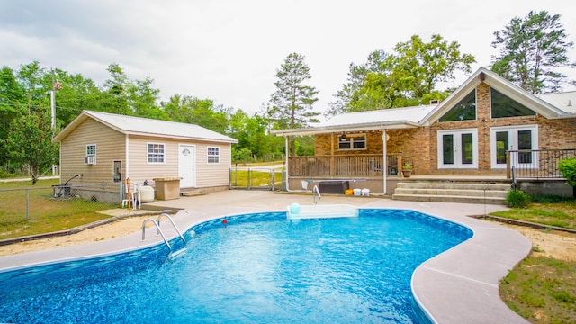 1097 Bob Mccaskill Dr, Defuniak Springs, FL 32433 - view of pool featuring french doors, a patio, and fence