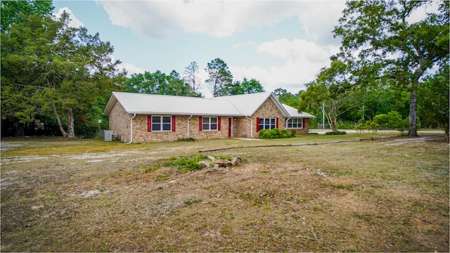 1097 Bob Mccaskill Dr, Defuniak Springs, FL 32433 - ranch-style home featuring a front lawn and brick siding