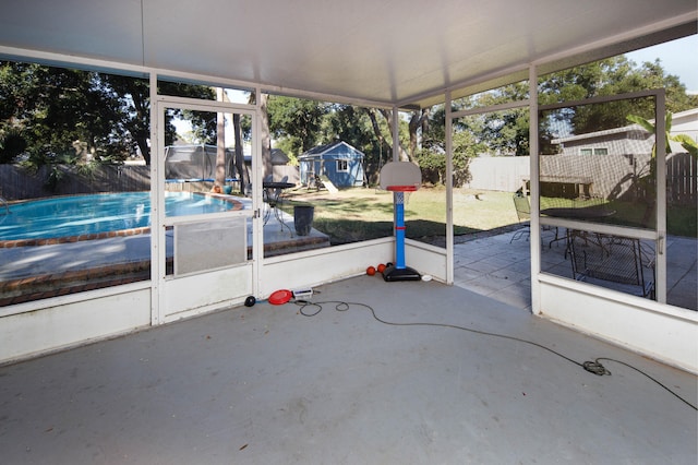 unfurnished sunroom featuring a healthy amount of sunlight