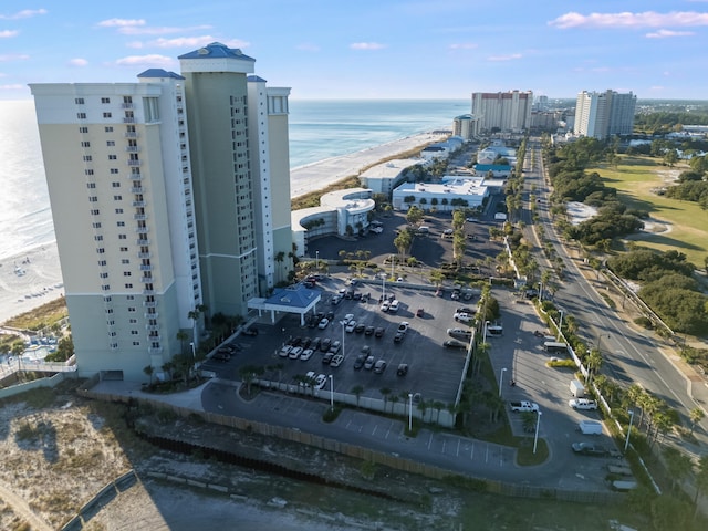 bird's eye view with a view of the beach and a water view