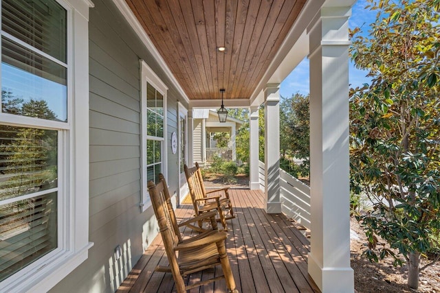 wooden deck featuring a porch