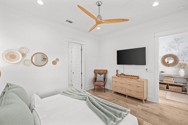 bedroom with wood-type flooring and ceiling fan