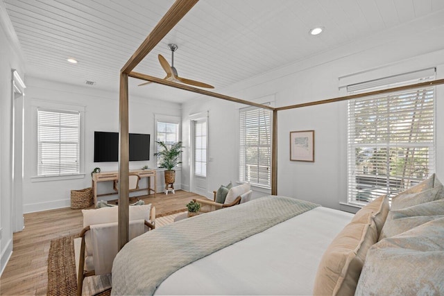 bedroom featuring ceiling fan, wooden ceiling, and light hardwood / wood-style flooring