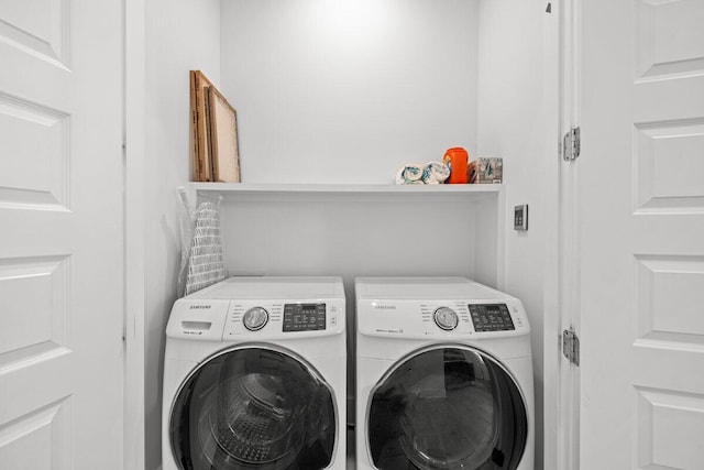 laundry room featuring independent washer and dryer