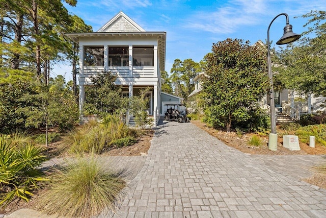 coastal inspired home with a carport