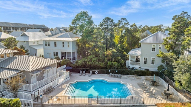 view of swimming pool with a patio area