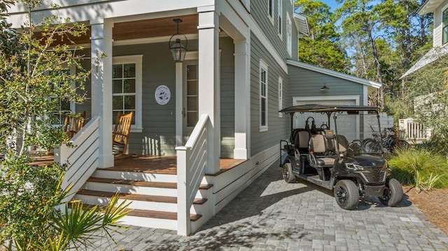 doorway to property with a porch