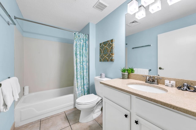 full bathroom featuring vanity, toilet, shower / bathtub combination with curtain, and a textured ceiling