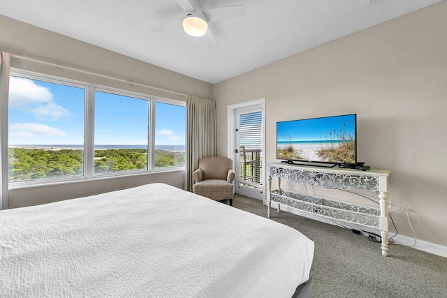 bedroom with ceiling fan and carpet flooring