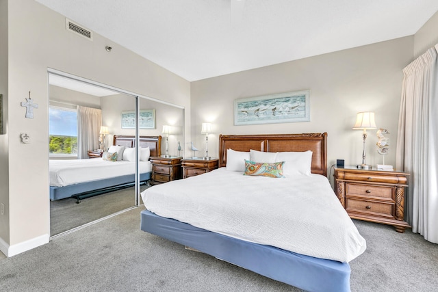 bedroom with a closet and carpet flooring