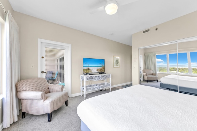 bedroom featuring ceiling fan and carpet floors