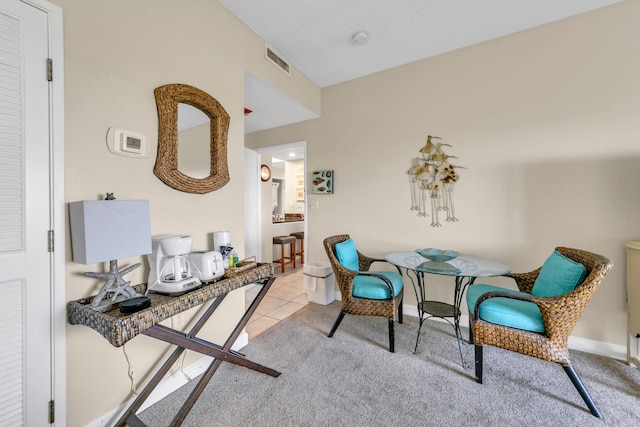 sitting room with light carpet