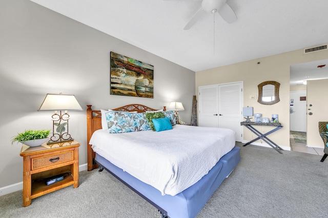 bedroom featuring a closet, carpet floors, and ceiling fan