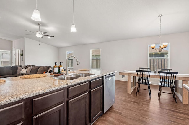 kitchen with dishwasher, hanging light fixtures, dark brown cabinets, sink, and dark hardwood / wood-style flooring