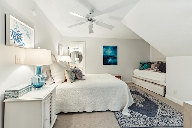 carpeted bedroom with baseboards and ceiling fan
