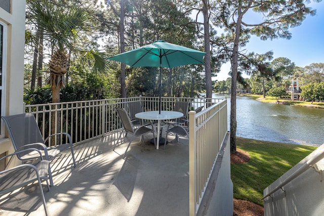 view of patio featuring a water view