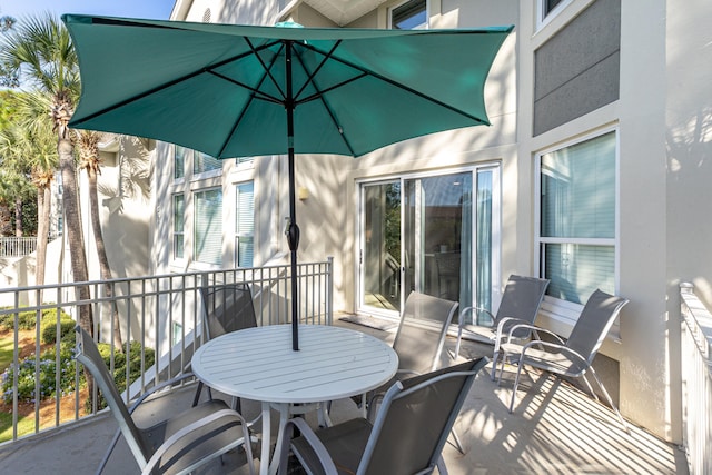exterior space with outdoor dining space