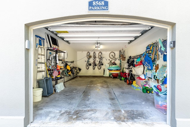 garage featuring a garage door opener