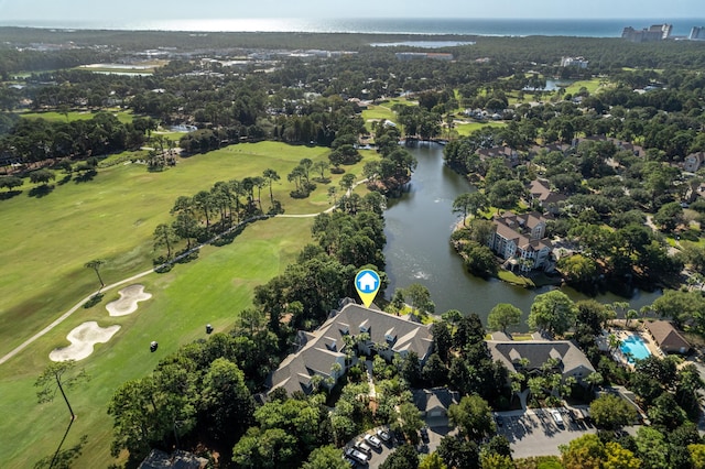 birds eye view of property with a residential view, a water view, and golf course view