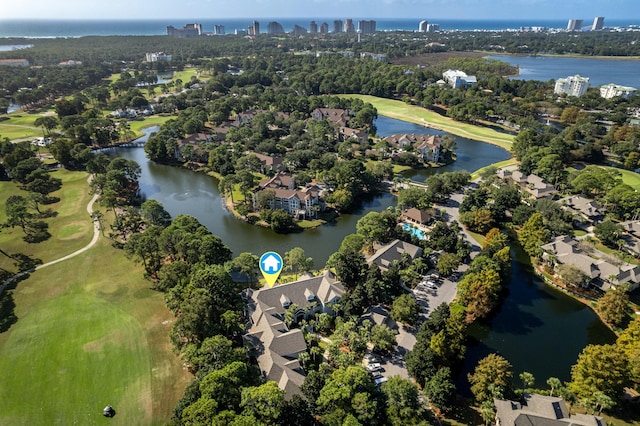 drone / aerial view featuring a water view and golf course view
