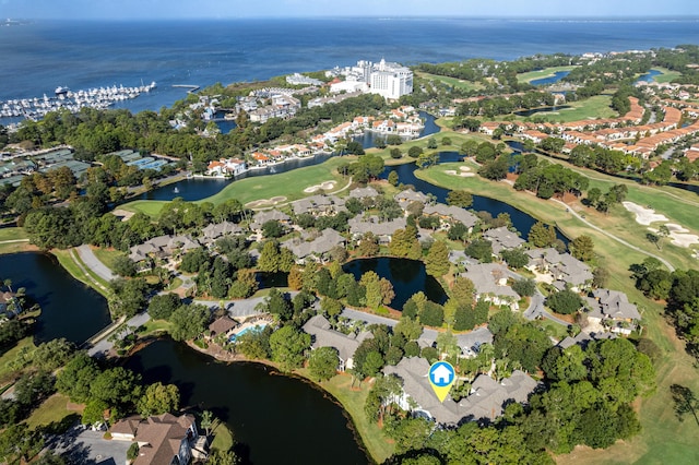 birds eye view of property featuring a residential view, a water view, and golf course view