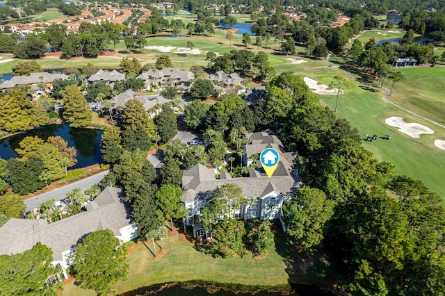 birds eye view of property with a residential view, view of golf course, and a water view