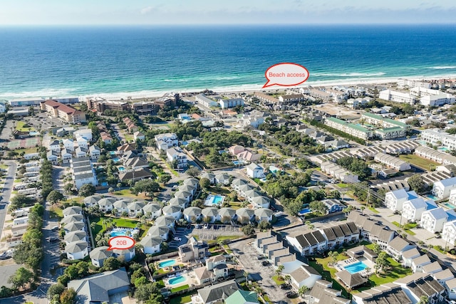 aerial view featuring a water view and a view of the beach