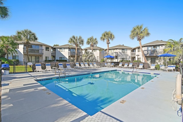 285 Payne St Unit 20B, Miramar Beach, FL 32550 - community pool with a residential view, fence, and a patio area
