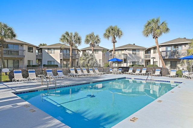 285 Payne St Unit 20B, Miramar Beach, FL 32550 - community pool featuring a residential view, fence, and a patio