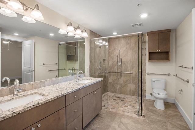 full bath featuring a sink, visible vents, and a shower stall