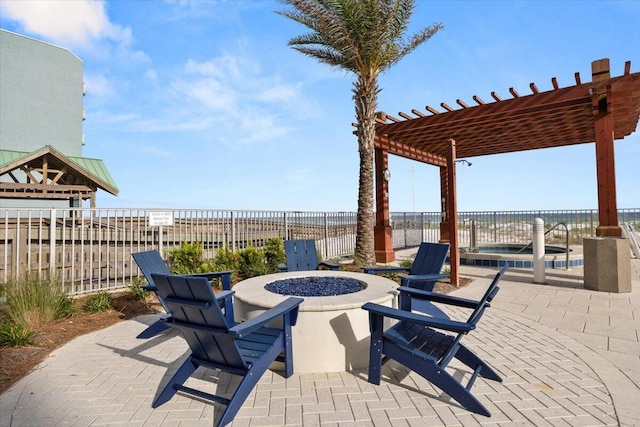 view of patio featuring a water view, fence, a fire pit, and a pergola