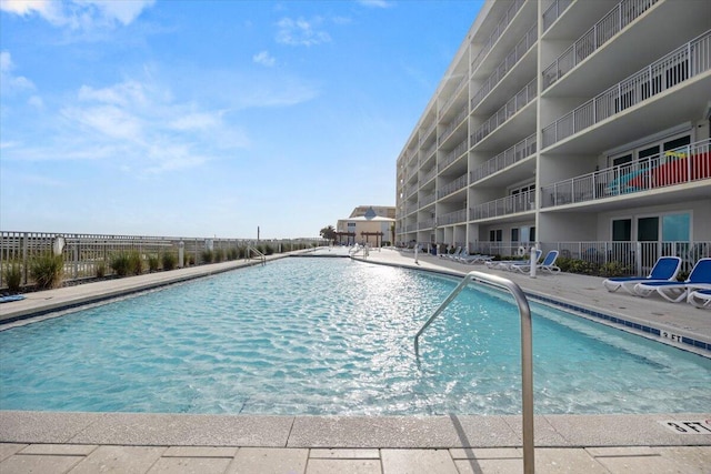 community pool with fence