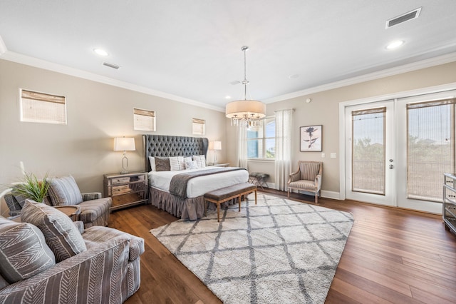 bedroom featuring ornamental molding, access to outside, french doors, and dark wood-type flooring