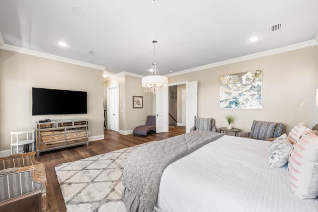 bedroom with crown molding, a chandelier, and dark hardwood / wood-style flooring