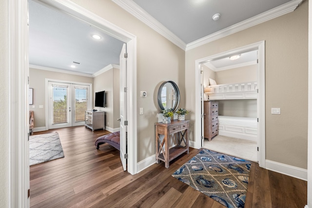 hall with crown molding, french doors, and dark hardwood / wood-style flooring