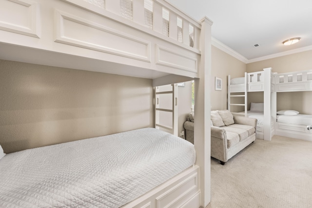 bedroom with light carpet and ornamental molding