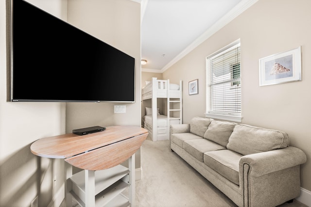 carpeted living room featuring ornamental molding