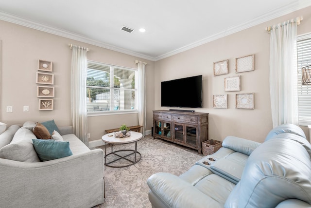 living room with ornamental molding