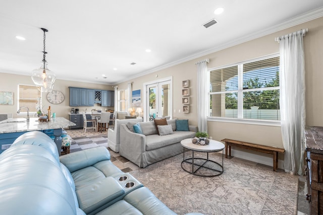 18 Spyglass Dr, Miramar Beach, FL 32550 - living area featuring healthy amount of natural light, crown molding, and recessed lighting