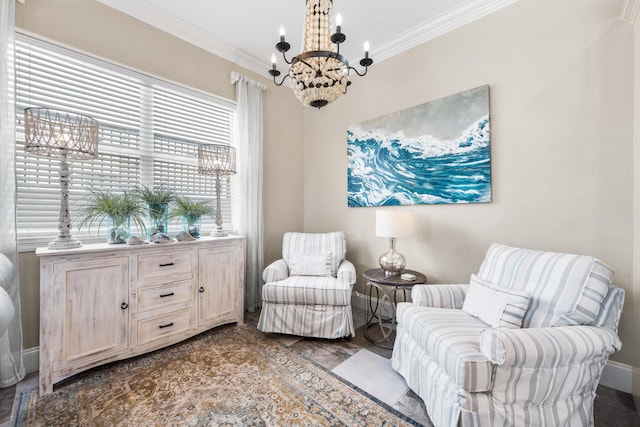 sitting room featuring ornamental molding and a chandelier