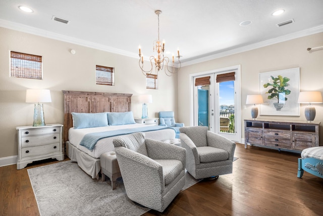 bedroom featuring ornamental molding, dark wood-type flooring, a notable chandelier, and access to exterior