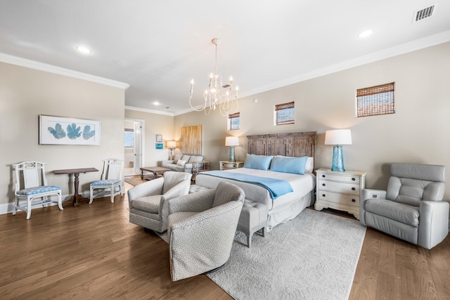 bedroom featuring crown molding, dark hardwood / wood-style floors, and a notable chandelier