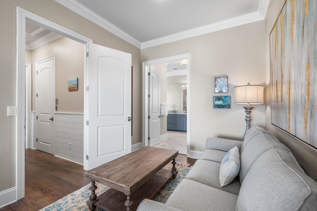 living room featuring crown molding and wood-type flooring