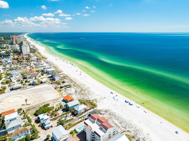 aerial view featuring a water view and a beach view