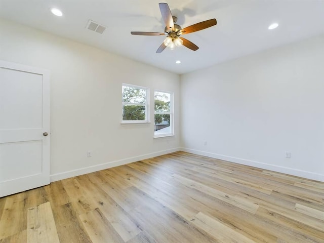 unfurnished room featuring ceiling fan and light wood-type flooring